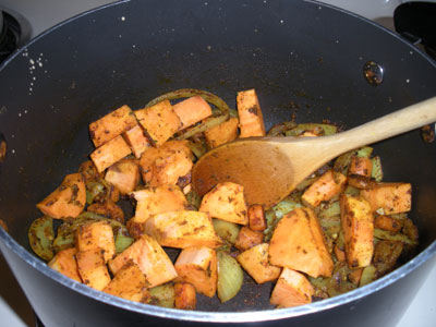 Cooking the sweet potatoes and onion